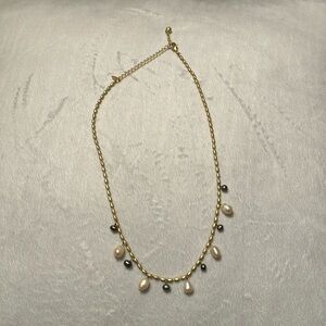 Avon necklace with gray and white beads and adjustable clasp